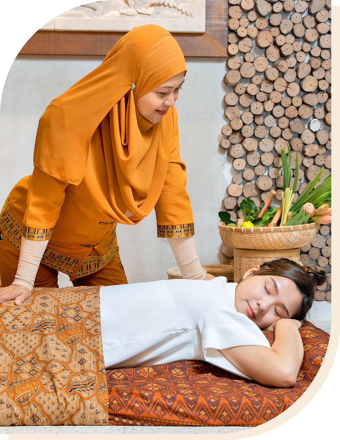 iBidan therapist performing authentic Malay massage